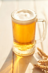 Oktoberfest beer. Glass beer mugs full of golden lager with thick frothy heads conceptual of  Oktoberfest. Beer mug. Big glass of lager beer from Bavaria and Munich Oktoberfest. Festival and Brewery