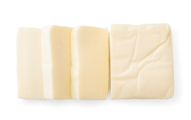 Cream cheese rectangular shape on a white. The view of the top.