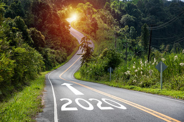 year 2020 with arrow direction on the curve road