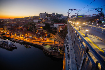 View from the Luis I Iron bridge over the Douro river at dusk, Porto, Portugal.