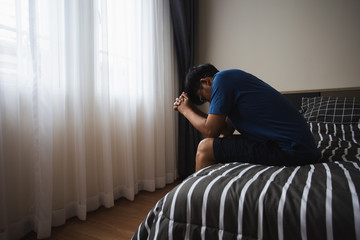 person with a gun in the bedroom