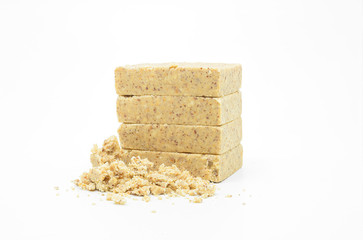 Pacoca, brazilian peanut candy with bran. Isolated, white background.