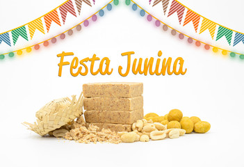 Brazilian Festa Junina background. Peanut candy and some peanuts snacks on a thematic background....