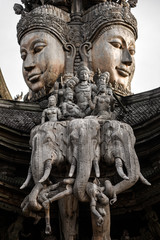 Fototapeta na wymiar god goddess wood sculpture statue, exterior architecture, Sanctuary of Truth, Thailand