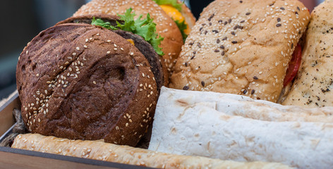 Close up of tasty ciabatta and burgers 