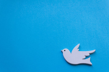white christmas holday decoration dove of peace and love symbol on light blue backround