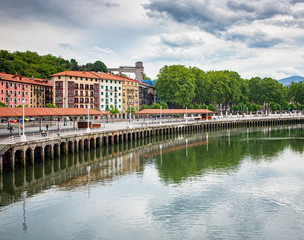 Fototapeta na wymiar View of the Estuary of Bilbao crossing the city, in Bilbao, Spain