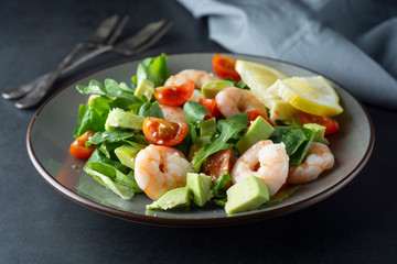 Salad with avocado and shrimps. Healthy fresh salad.