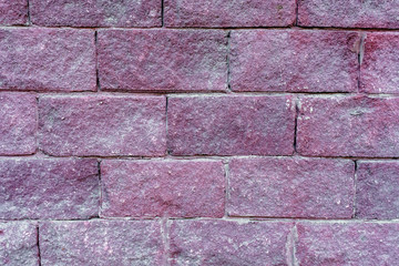 old pink brick wall close up