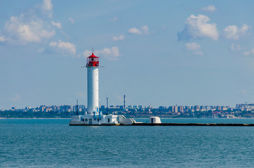 Seascape with lighthouse on the Black Sea in Odesa during the summer season