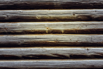 Obraz premium Old wooden log house wall background texture