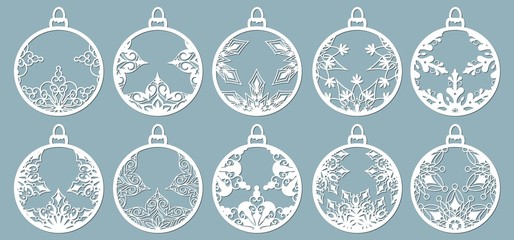 Christmas balls set with a snowflake cut out of paper. Templates for laser cutting, plotter cutting or printing. Festive background.