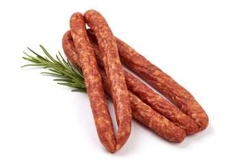 Long thin dry sausages, isolated on white background