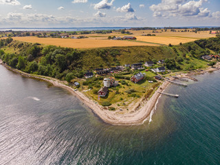Aerial view of Haken lighthouse and the south east side of the island Ven in southern Sweden in the baltic sea. Taken a warm summer day during tourist season. 