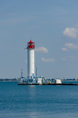 Seascape with lighthouse on the Black Sea in Odesa during the summer season