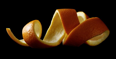 Orange peel isolated on black background