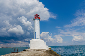 Seascape with lighthouse on the Black Sea in Odesa during the summer season