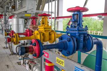 Colored cranes on railway loading, for connection, red "steam", yellow "nitrogen", blue"air".