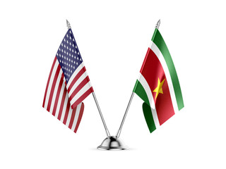 Desk flags, United States America and Suriname, isolated on white background. 3d image.