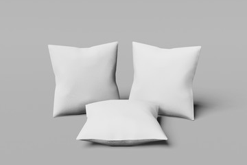 Fototapeta na wymiar Three White square mocap pillow on a gray background. 3D rendering.