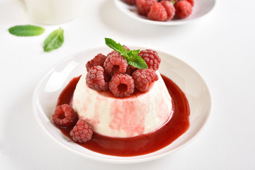 Panna cotta with fresh raspberries