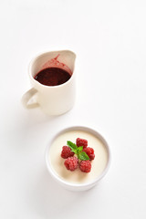 Panna cotta with fresh raspberries