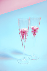 Colorful candy sprinkles in a champagne glass