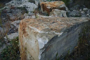 a pile of huge stones lying on the ground.