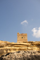 Lanscape near st.Angelo fort on Malta. Blue sea, windows and defenc tower.