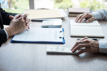 Dishonest cheating in business illegal money, Businessman giving bribe money in business people to accept agreement contract of investment deal, Bribery and corruption concept