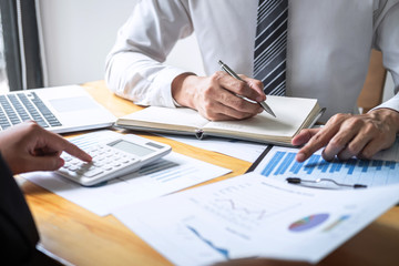 Professional Business partner discussing ideas planning and presentation project at meeting working and analysis at workspace, financial and investment concept, collaborative teamwork analyze data