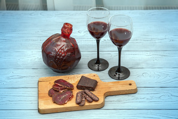 Pomegranate Armenian wine and meat appetizer