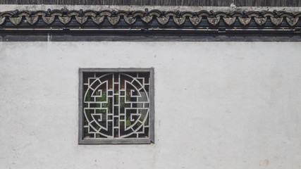 Chinese window on white wall