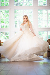 Fototapeta premium Beautiful bride in white dress