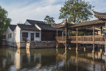 Fototapeta na wymiar Chinese architecture by river in old town of Nanxun, China