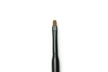 makeup tool brush , false eye lashes on white background 