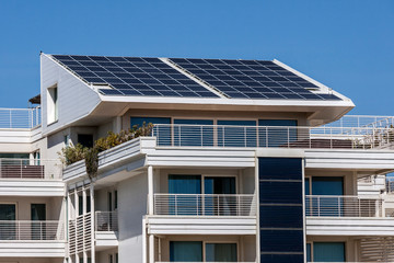 Solar panels on the roof of a modern building - photography