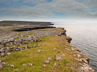 The edge of a cliff. Inishmore, Aran islands, Ireland, Atlantic ocean, Popular tourists destination with amazing views.