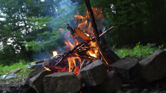 Details of burining campfire in slow motion