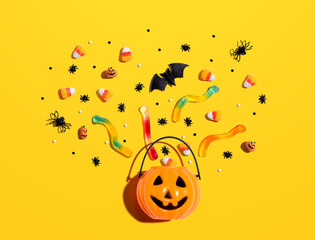 Halloween pumpkin with decorations - overhead view flat lay