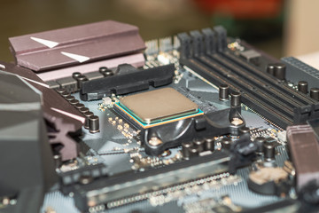 Close-up of computer motherboard and processor components  , modern technology