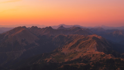 Fototapeta na wymiar morning glowing light on the summits of Agrafa Mountain Range 