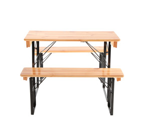 Wooden picnic table with benches on white background