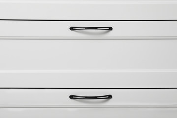 Modern white chest of drawers as background