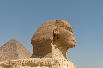 The Great Sphinx of Giza with Pyramid in Background