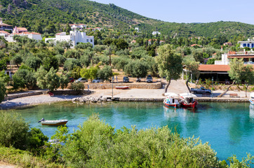 Fototapeta na wymiar View to the picturesque little harbor of Steni Vala village, Alonnisos island, Greece