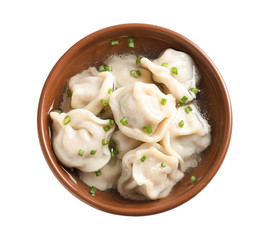 Bowl of tasty dumplings in broth isolated on white, top view