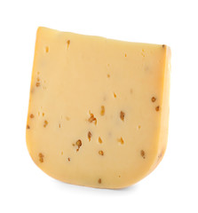 Piece of tasty cheese with fenugreek isolated on white