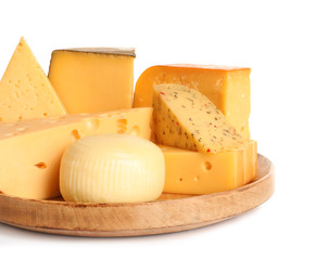 Wooden plate with different kinds of cheese on white background