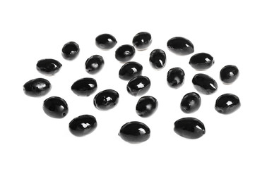 Tasty black olives on white background. Layer for pizza